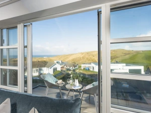 Furnished balcony access via living room with sea views - Sandyford