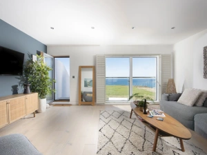 Views to the sea in the lounge area - 66 Pentire