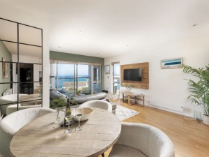 Living and dining areas with balcony access and sea views - 6 The Point, Pentire