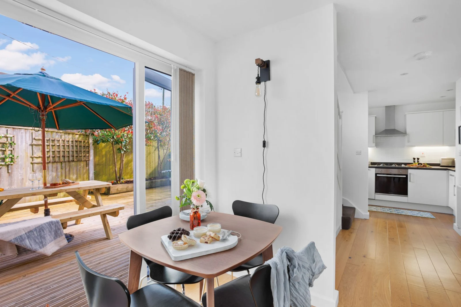 Dining area with access to rear patio - Vickery's Cottage
