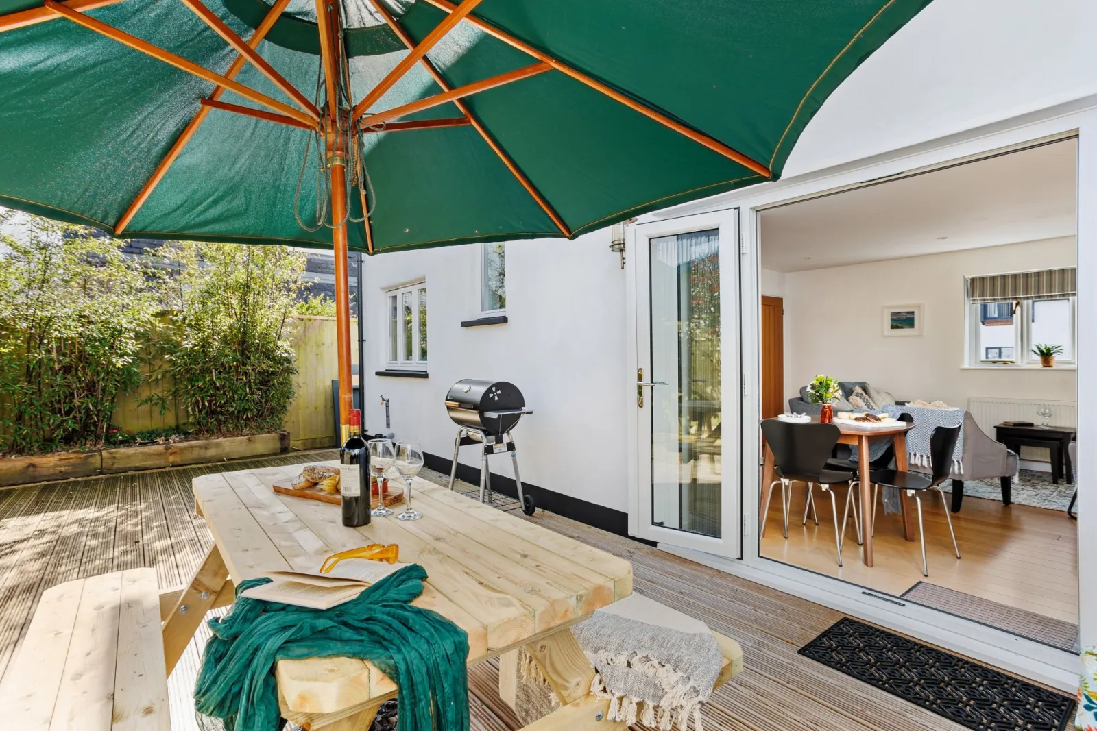 Furnished rear deck with parasol & charcoal BBQ - Vickery's Cottage