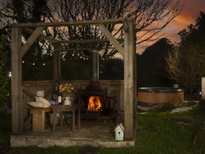 Outside wood burner with seating area - Worvas Counthouse