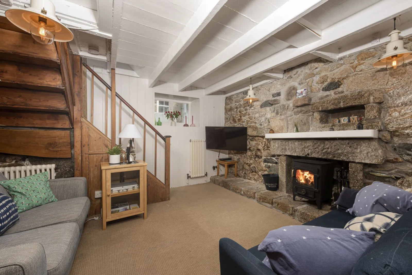 The woodburner, Tv and seating for all guests - No.1 St Eia
