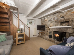 The woodburner, Tv and seating for all guests - No.1 St Eia