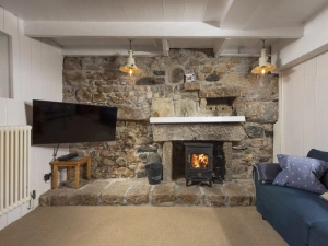 Cosy living room with woodburner - No.1 St Eia