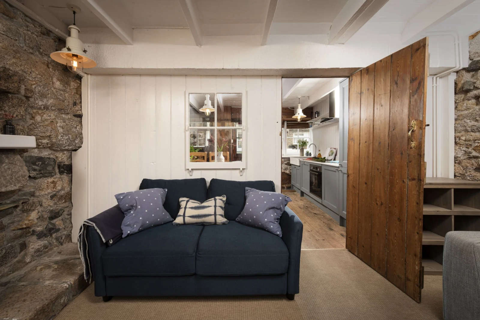 A sofa with scatter cushions - No.1 St Eia