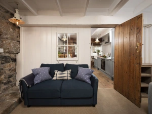 A sofa with scatter cushions - No.1 St Eia