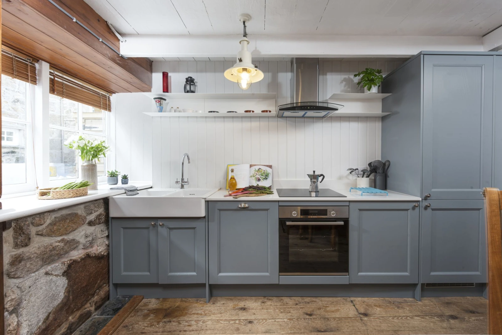 The kitchen with an oven and hob - No.1 St Eia