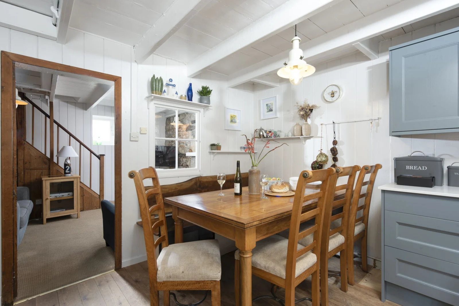 The dining room in the kitchen with seating for all guests - No.1 St Eia