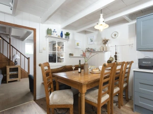 The dining room in the kitchen with seating for all guests - No.1 St Eia