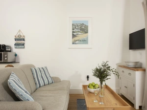 Smart Tv and sofa in open plan living space - 55 Una