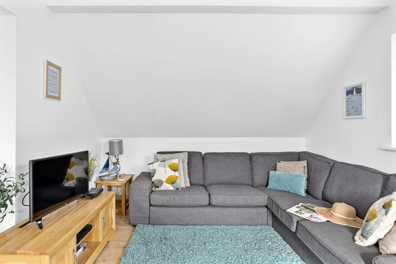 Living area with L shaped sofa, Smart Tv and free WiFi -  Midholm Chapel