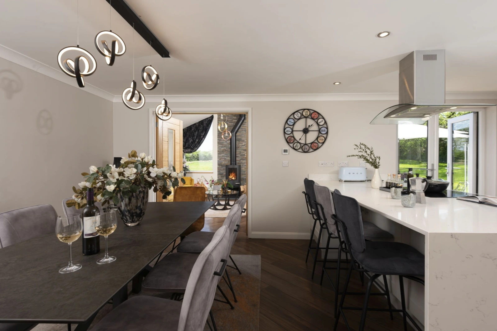 A lovely dining table to seat all guests and breakfast bar - Highfield Barton