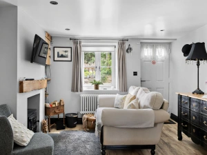 Cozy living area with wood burner, Smart TV, Free Wi-Fi - Apothecary Cottage