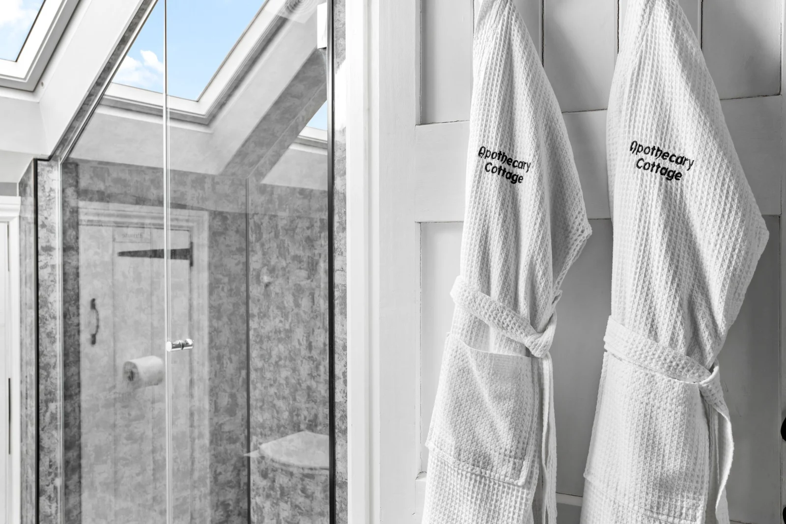 Shower room with bath robes - Apothecary Cottage
