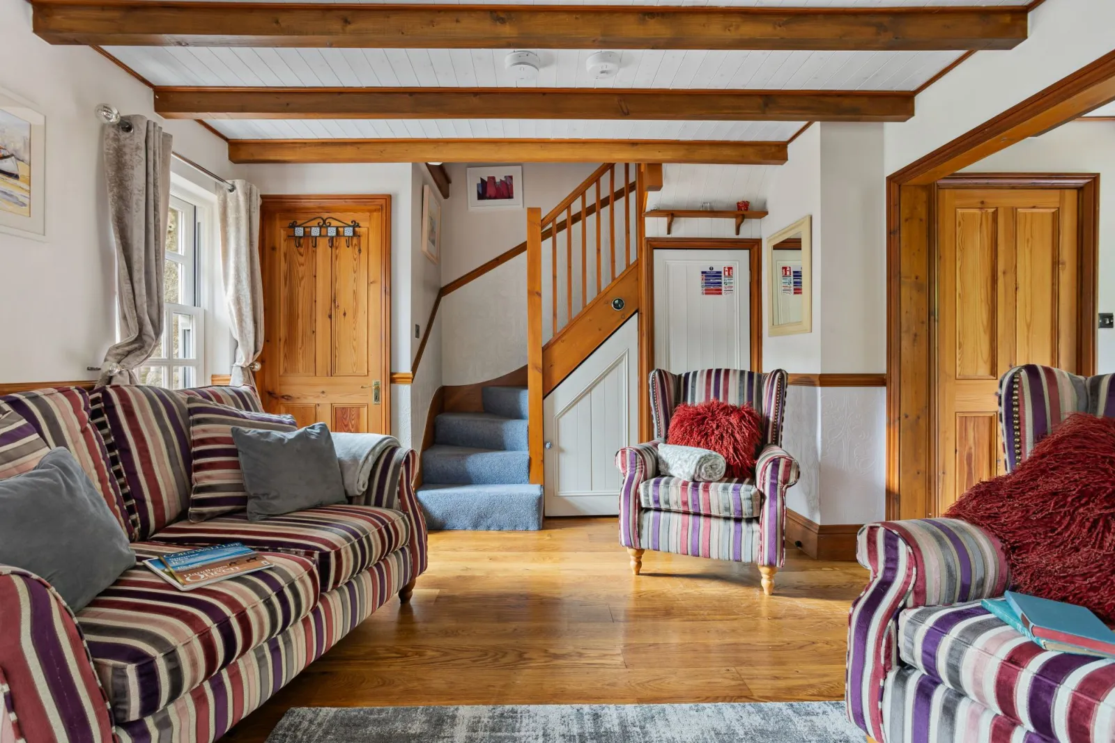 Living room with comfortable seating - Beryas Cottage