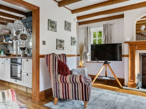 Living room with kitchen beside - Beryas Cottage