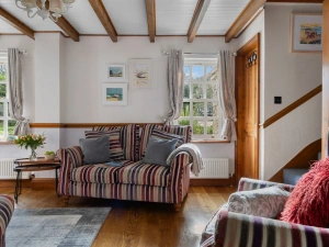 Plenty of seating in the living room - Beryas Cottage