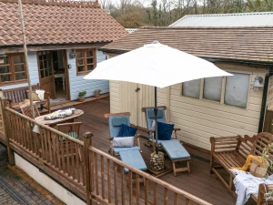 Sun loungers, outdoor area, Log cabin - Porth Chapel within Buryas bridge collection 