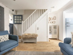 Living room with access to upstairs area and stable door - Happy Days Cottage