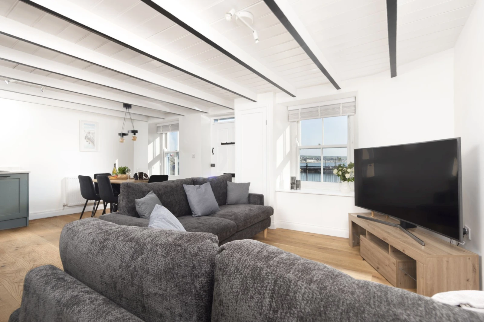 Open plan living, dining and kitchen for relaxed family living  - Harbour Watch Cottage