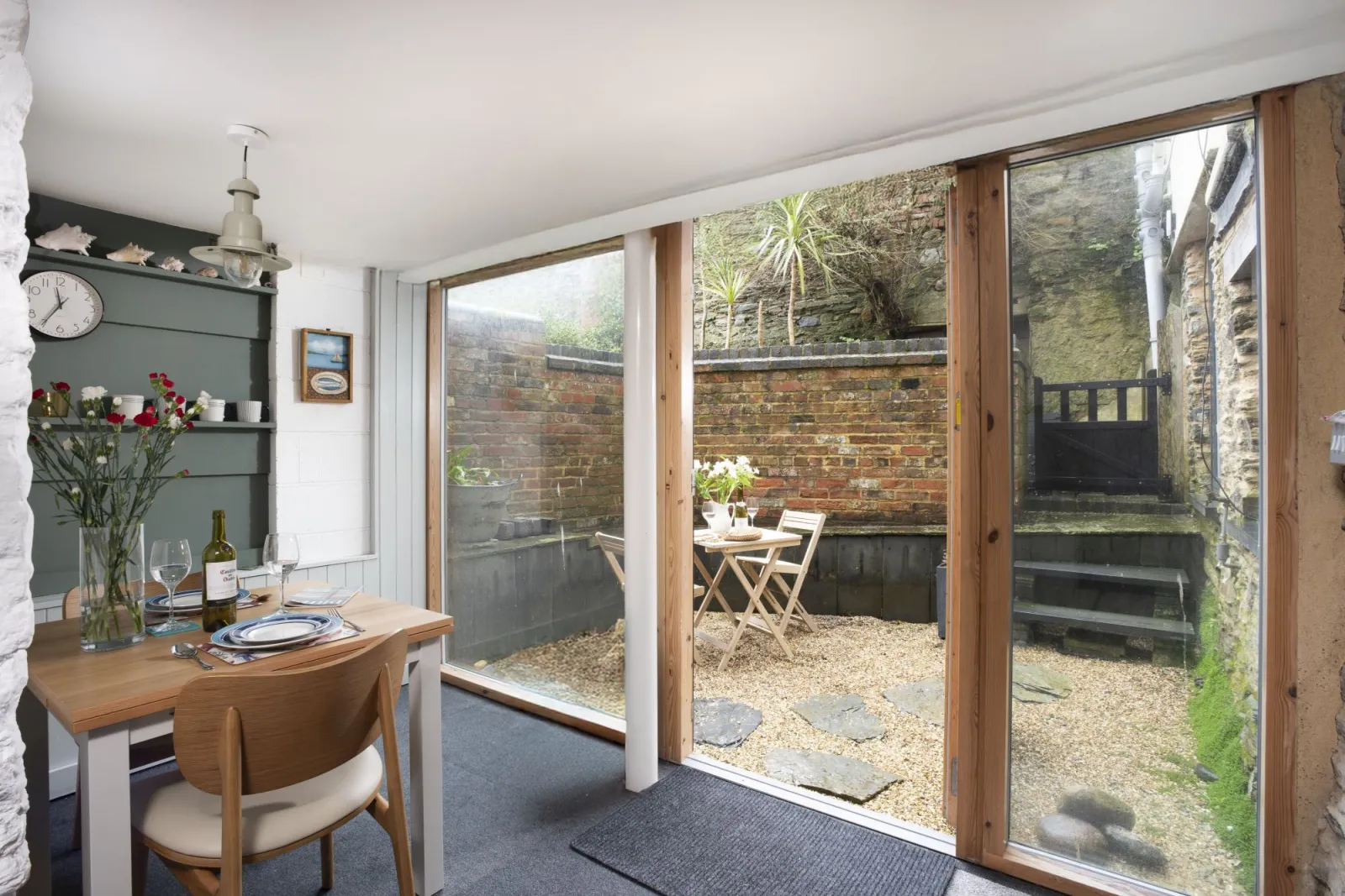 Dining area looking out over the private courtyard - An Selder