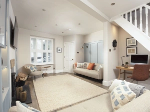 View of living space, dedicated work area and cosy lounge - Myrtle Cottage