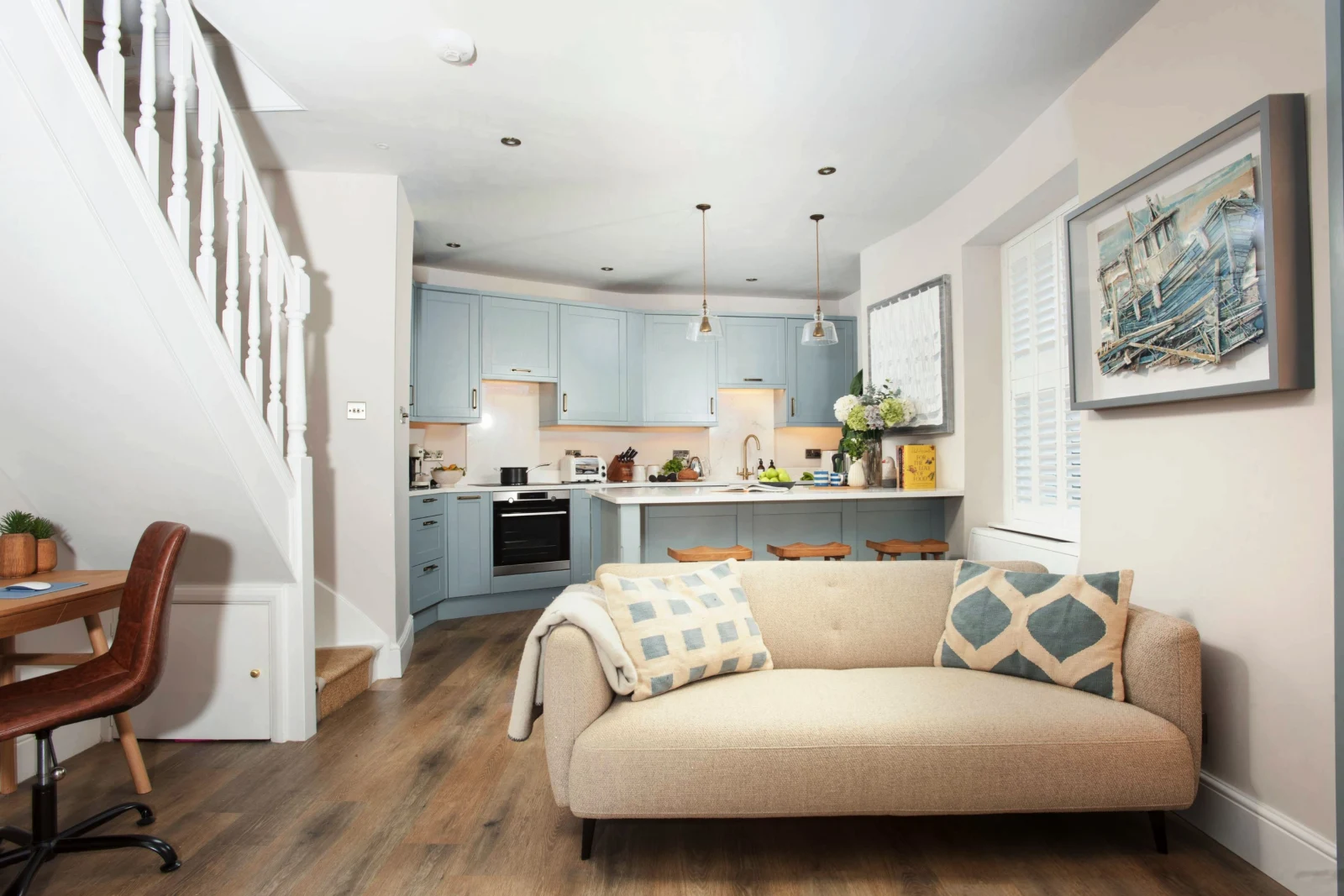 Open plan living, sofa, kitchen and work space - Myrtle Cottage