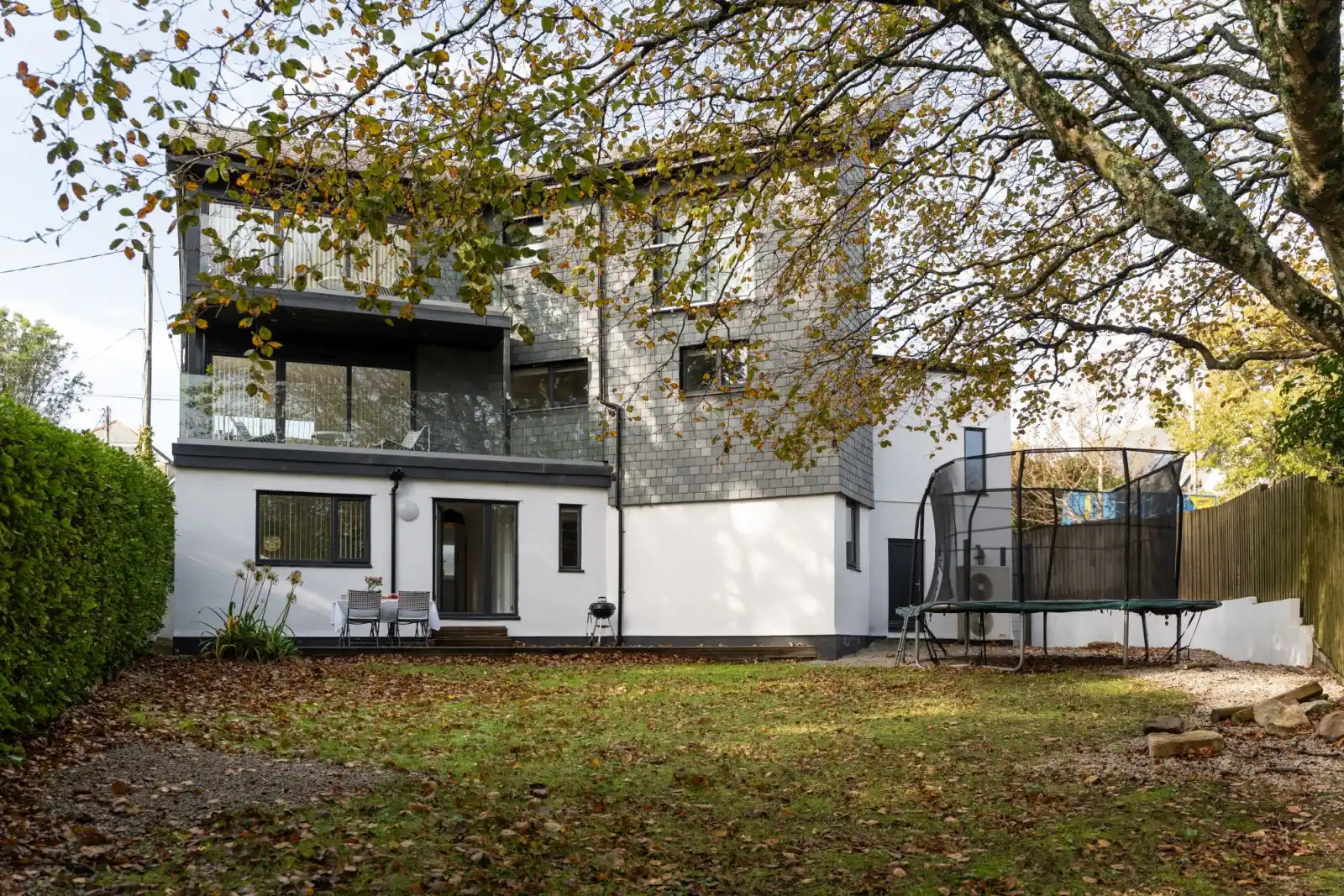 Property building and enclosed garden - Estuary Watch