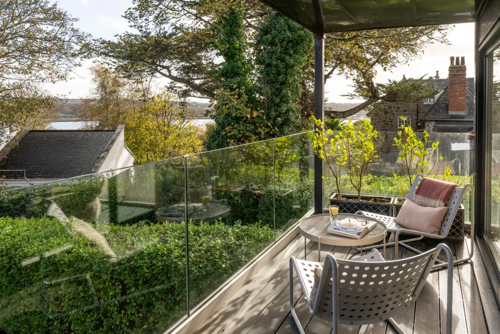 Balcony located off the living space with seating - Estuary Watch