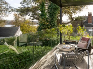 Balcony located off the living space with seating - Estuary Watch