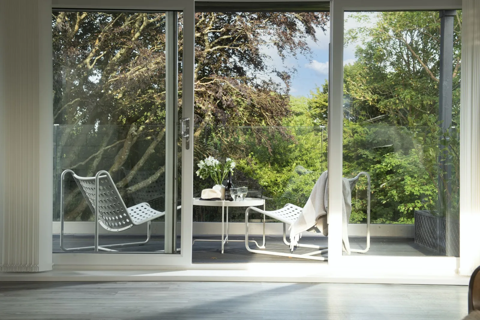 Balcony located off the living space with seating - Estuary Watch