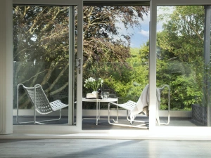 Balcony located off the living space with seating - Estuary Watch
