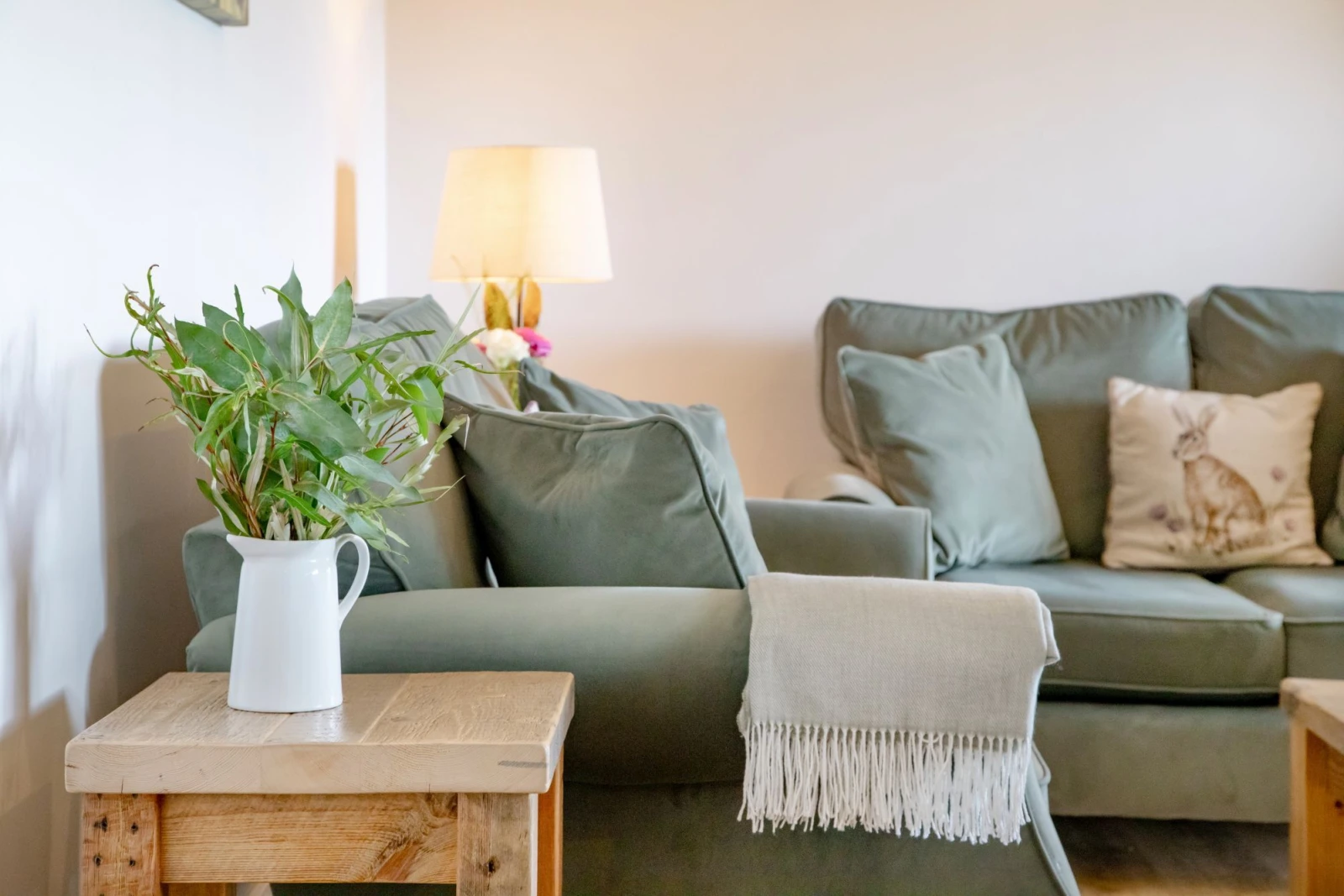 Sofa in living space, side tale and coffee table  - Longpark Linhay