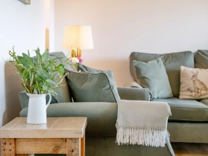 Sofa in living space, side tale and coffee table  - Longpark Linhay