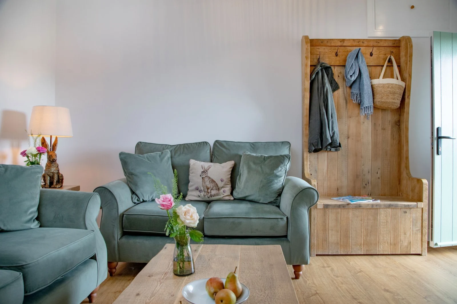 Comfy sofas and TV with coffee table and coat rack  - Longpark Linhay