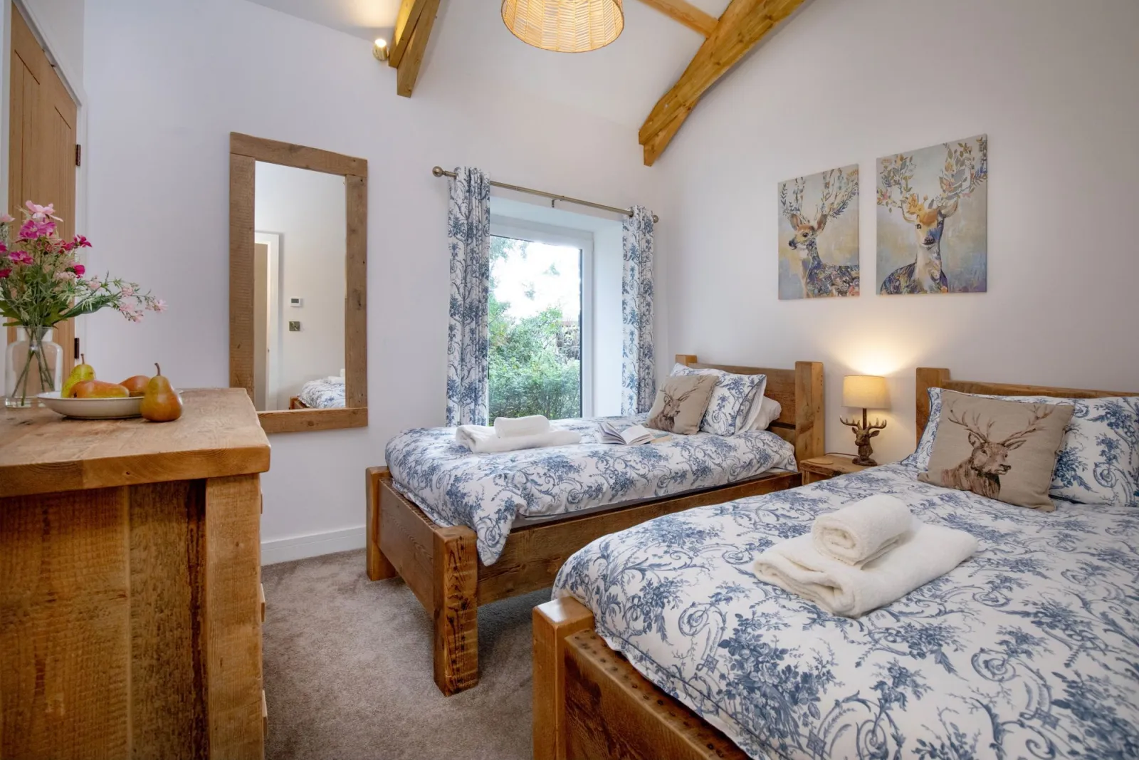 Twin beds in bedroom two, chest of drawers and bedside tables with lamps  - Longpark Linhay