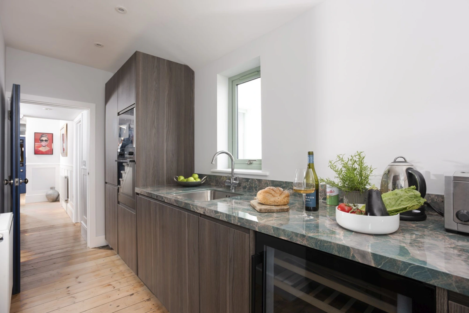 Kitchen area with plenty of cooking space, wine cooler, fridge, freezer - Mermaids 3