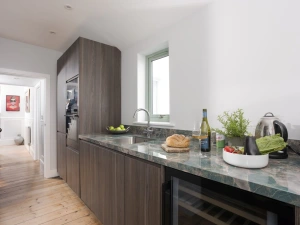 Kitchen area with plenty of cooking space, wine cooler, fridge, freezer - Mermaids 3