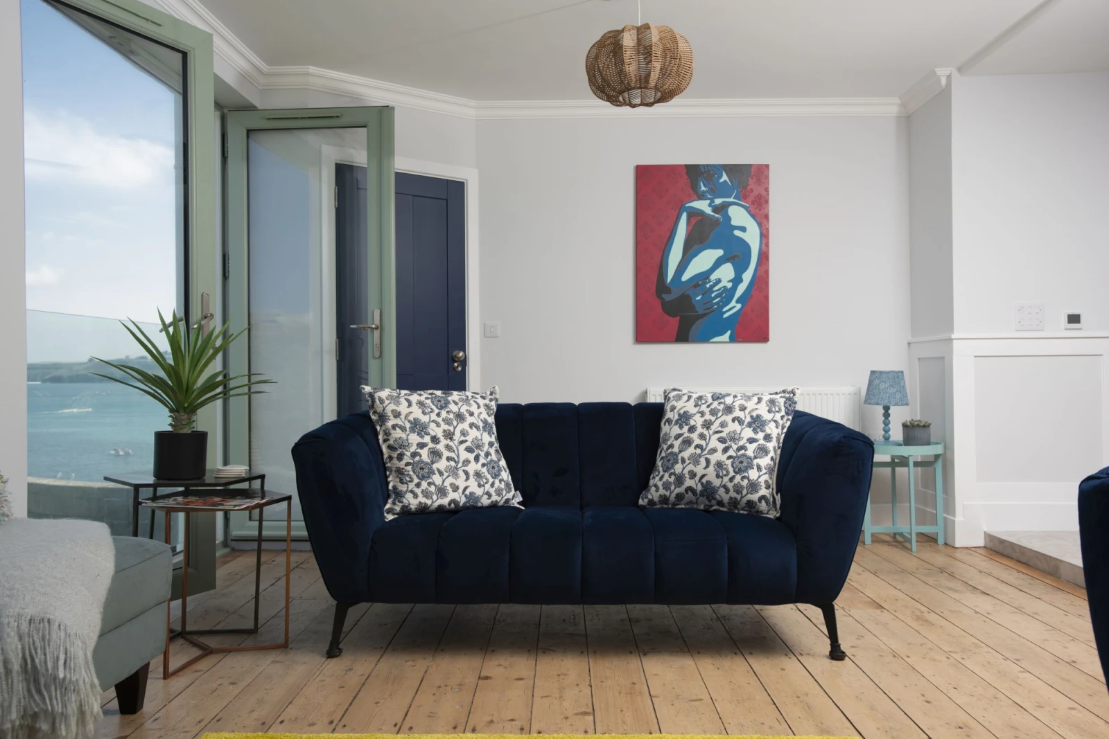 Sofa in living area, side coffee tables - Mermaids