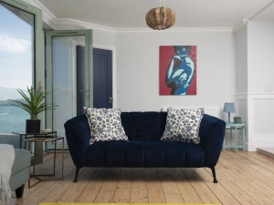 Sofa in living area, side coffee tables - Mermaids