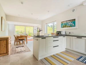 Spacious kitchen diner opens out onto the garden