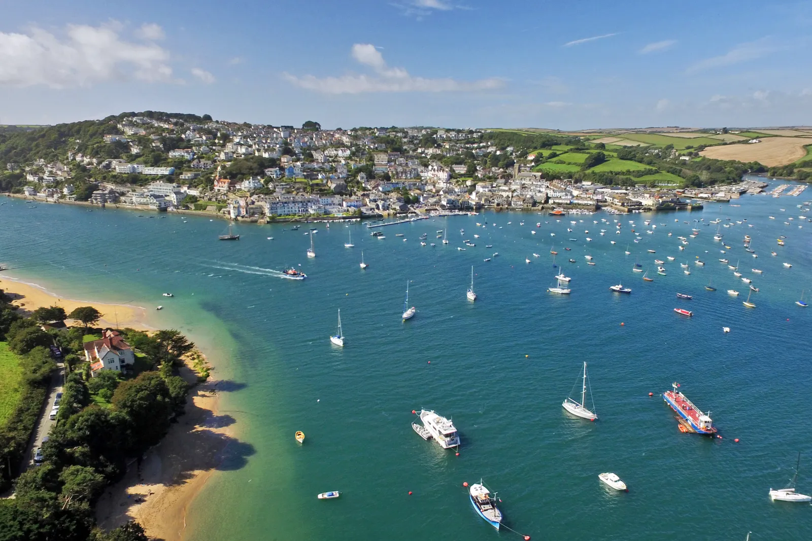 The beautiful Salcombe and Kingsbridge estuary a 10 minute walk from the property., including the beach and cafe and Sauna at The Old Stable.