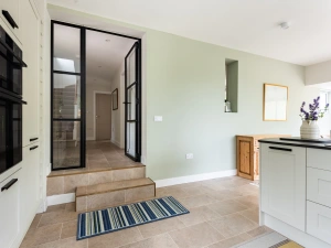 Step down from the hall into the spacious kitchen diner