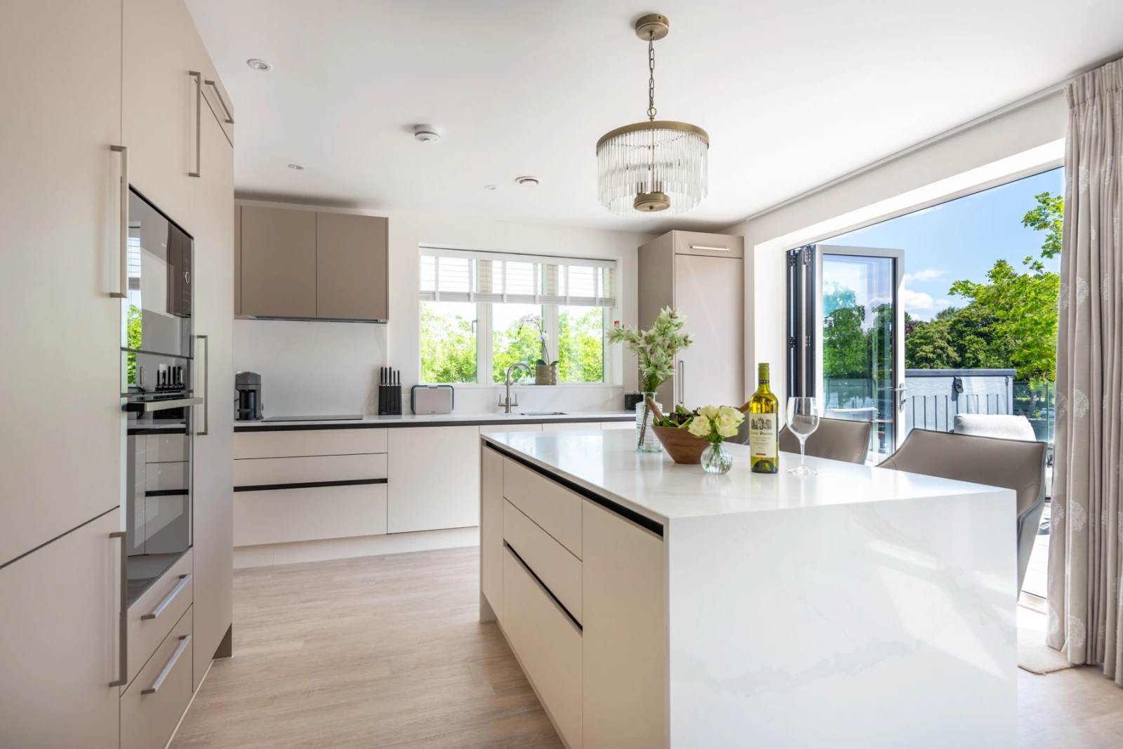Stunning kitchen leading on to the terrace with estuary views