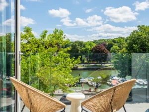 The beautiful balcony off the living room with estuary and town views
