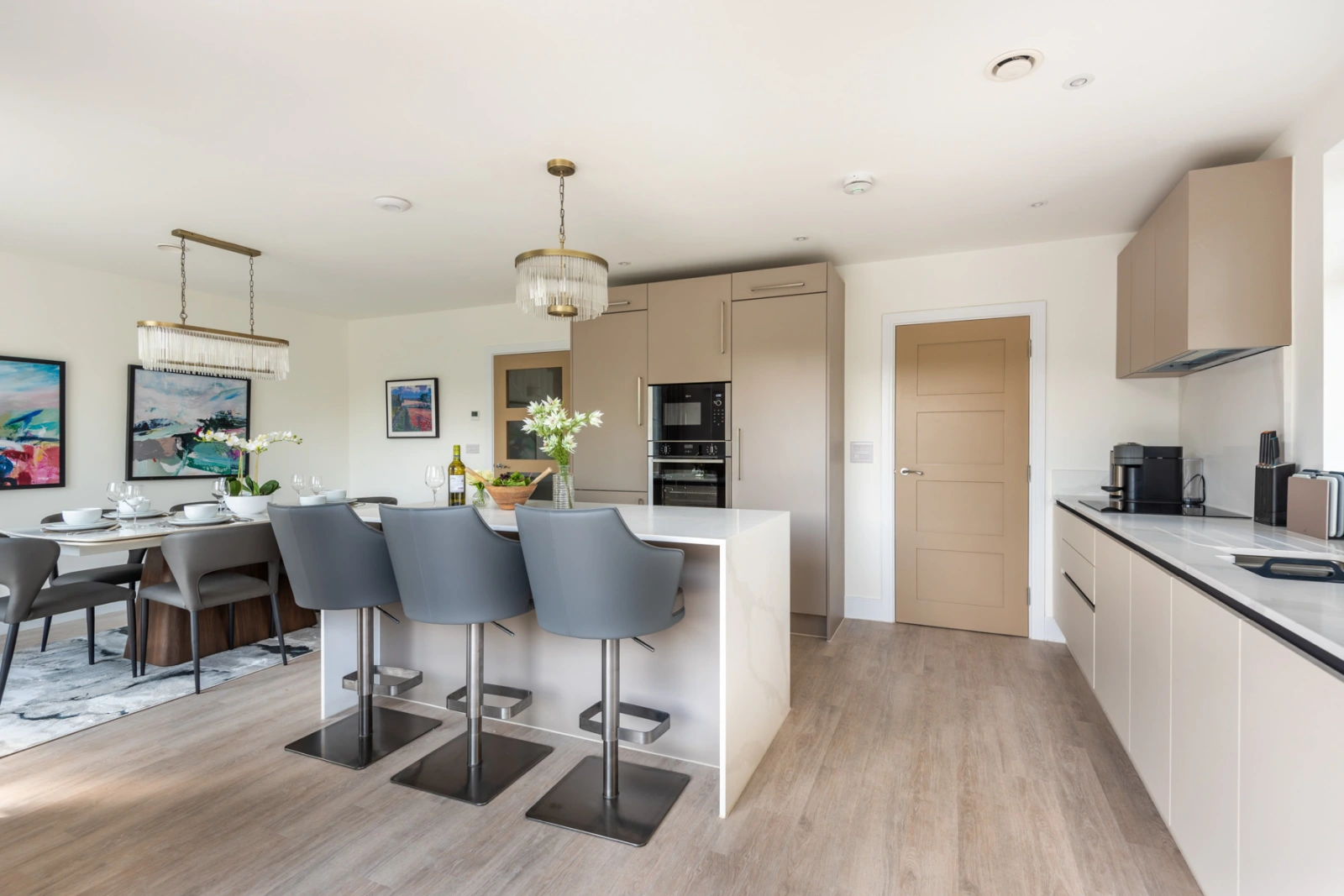 Contemporary kitchen with utility room leading off it