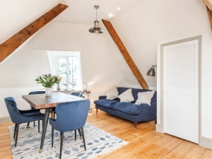 Stylish open-plan dining and living room.