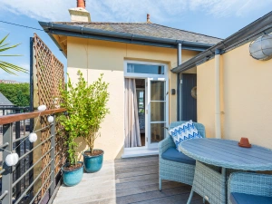 Relax with a morning coffee or cuppa on the decked terrace.