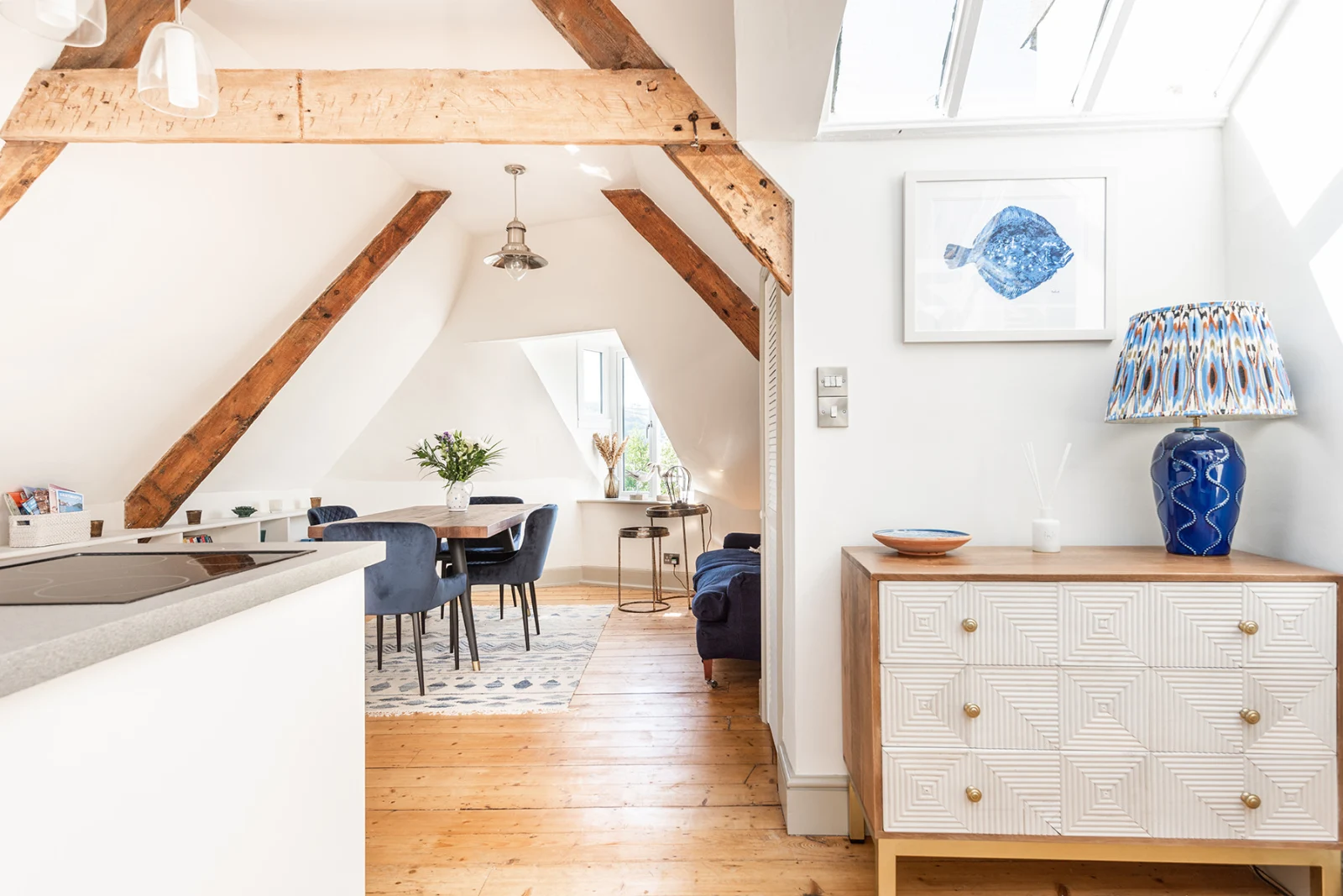 Bright and beautifully presented open plan dining and sitting area.